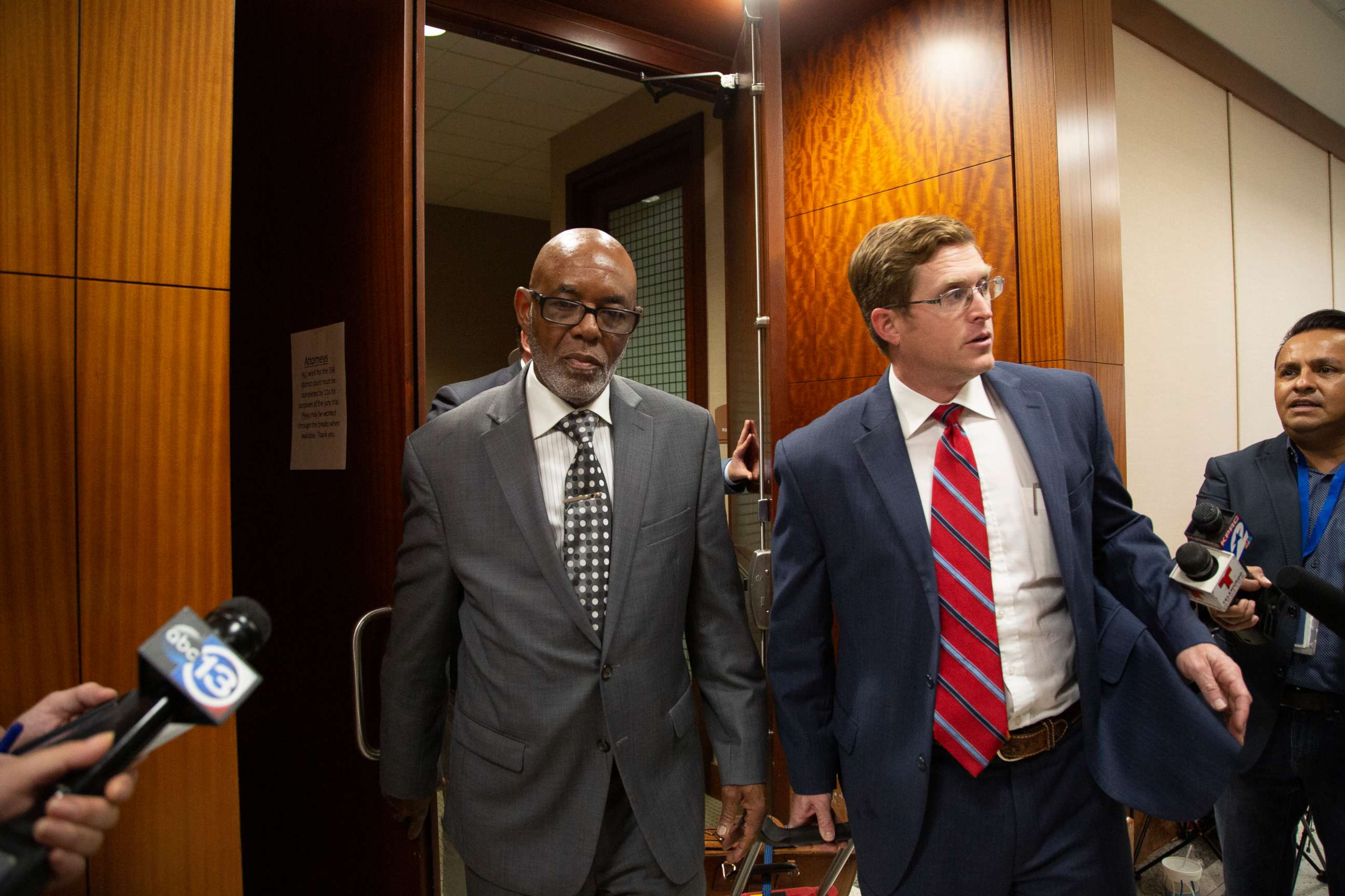 PHOTO: Otis Mallet, center, exits the 338th District Criminal Court with his lawyer Jonathan Landers, right, Jan. 9, 2020,