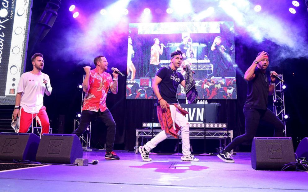 PHOTO: Singers Dan Miller, Jacob Underwood, Erik-Michael Estrada and Trevor Penick of O-Town perform during the Pop 2000 Tour at the Fremont Street Experience on July 27, 2019, in Las Vegas.