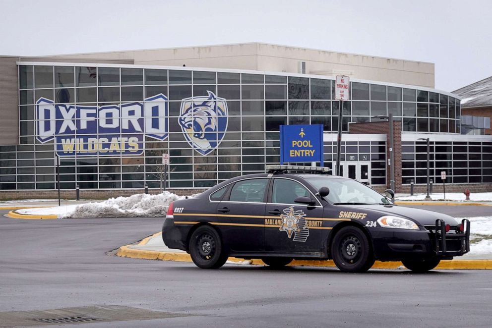 PHOTO: A police vehicle remains parked outside of Oxford High School, Dec. 1, 2021, in Oxford, Mich.