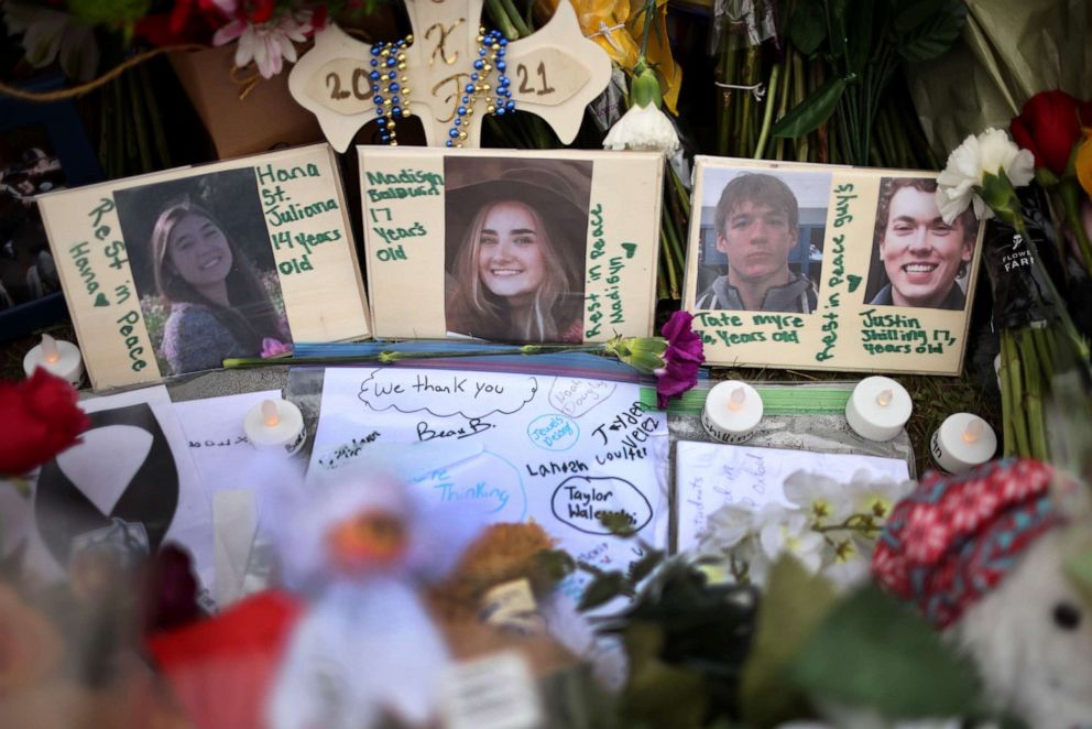 PHOTO: A memorial outside of Oxford High School continues to grow, Dec. 3, 2021, in Oxford, Mich.