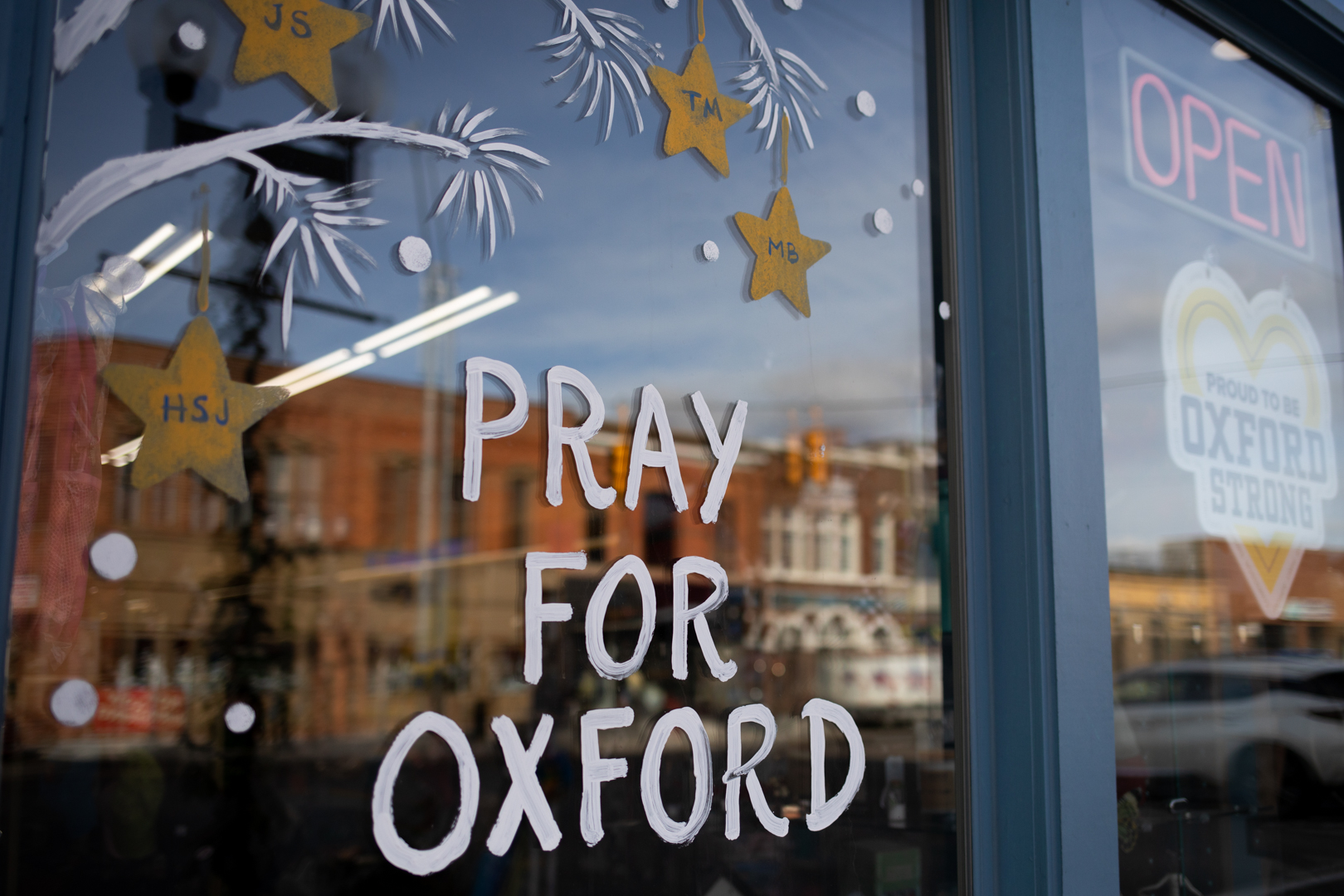PHOTO: Signage on display in windows of businesses to show support for Oxford High School on Dec. 7, 2021 in Oxford, Michigan. Four students were killed and seven others injured on Nov. 30, when a student allegedly opened fire at the school. 