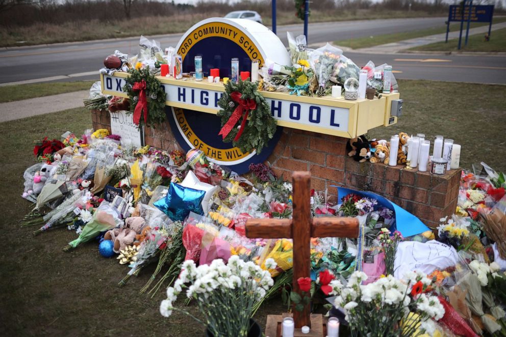PHOTO: A memorial outside of Oxford High School continues to grow, Dec. 3 2021, in Oxford, Michigan.