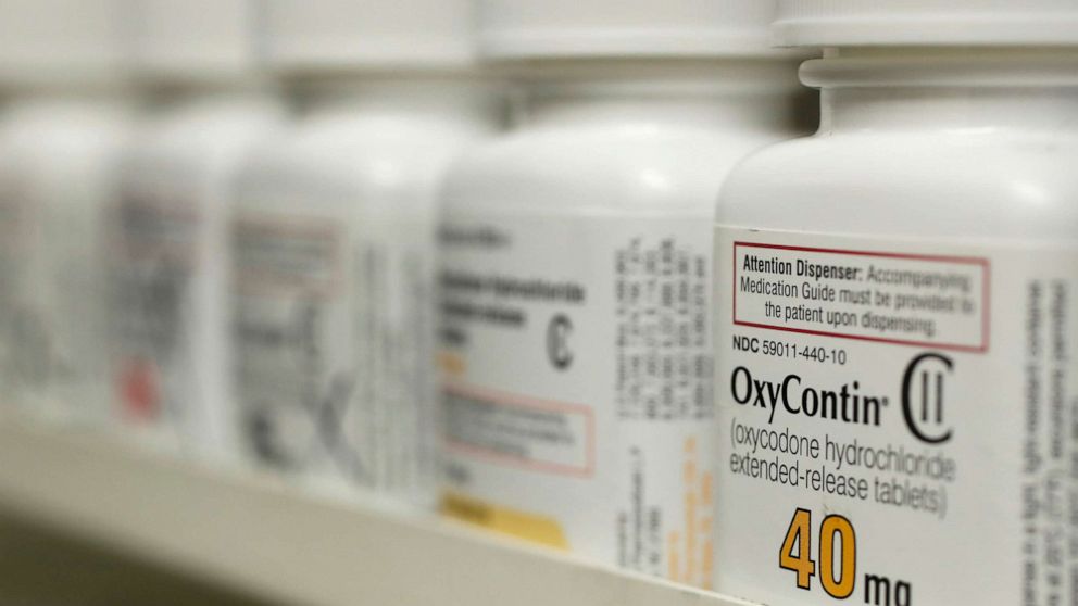 FILE PHOTO: Bottles of prescription painkiller OxyContin, 40mg pills, made by Purdue Pharma L.D. sit on a shelf at a local pharmacy, in Provo, Utah, U.S., April 25, 2017.