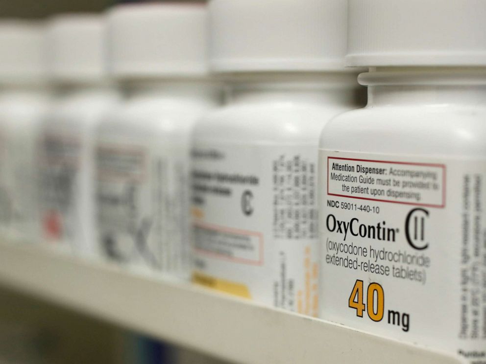 FILE PHOTO: Bottles of prescription painkiller OxyContin, 40mg pills, made by Purdue Pharma L.D. sit on a shelf at a local pharmacy, in Provo, Utah, U.S., April 25, 2017.
