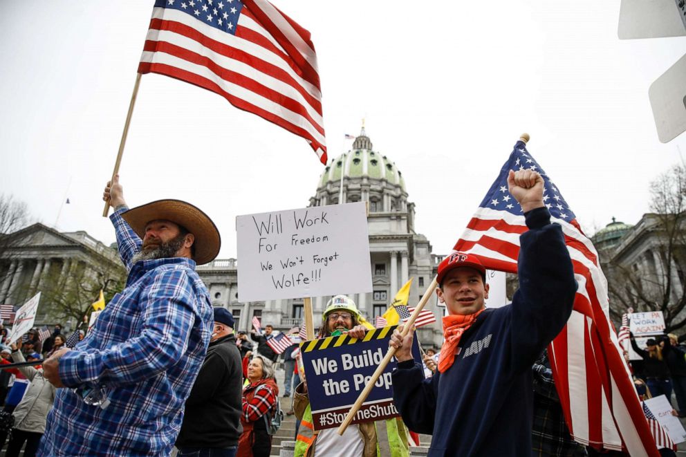PHOTO: Protesters demonstrate at the state Capitol in Harrisburg, Pa., April 20, 2020, demanding that Gov. Tom Wolf reopen Pennsylvania's economy even as new social-distancing mandates took effect at stores and other commercial buildings.