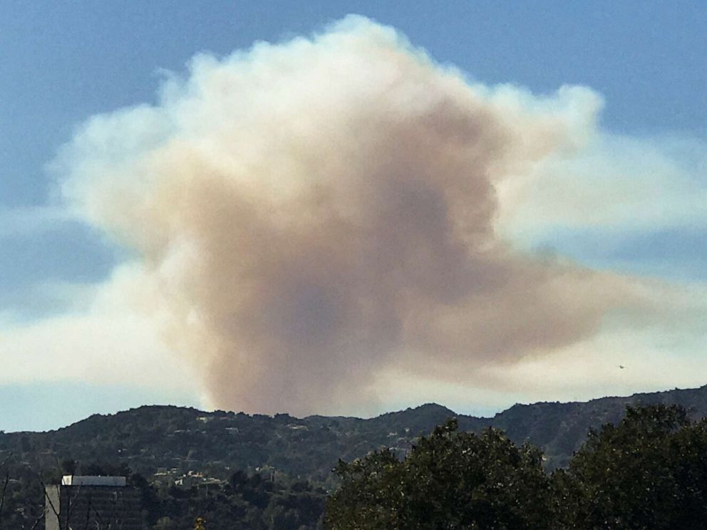 Crews race to stop brush fire in Pacific Palisades ...