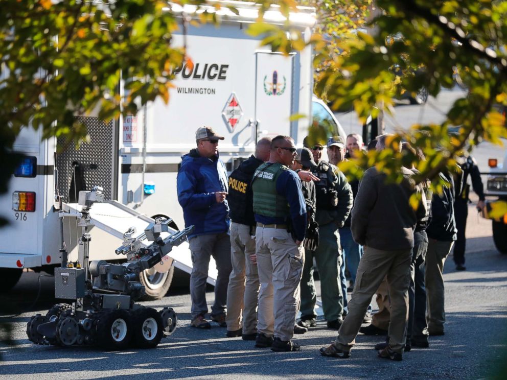 PHOTO: Local and federal authorities remove a suspicious package found at a US postal facility in Wilmington, Del., Oct. 25, 2018. A law enforcement official said suspicious packages addressed to former Vice President Joe Biden were intercepted.