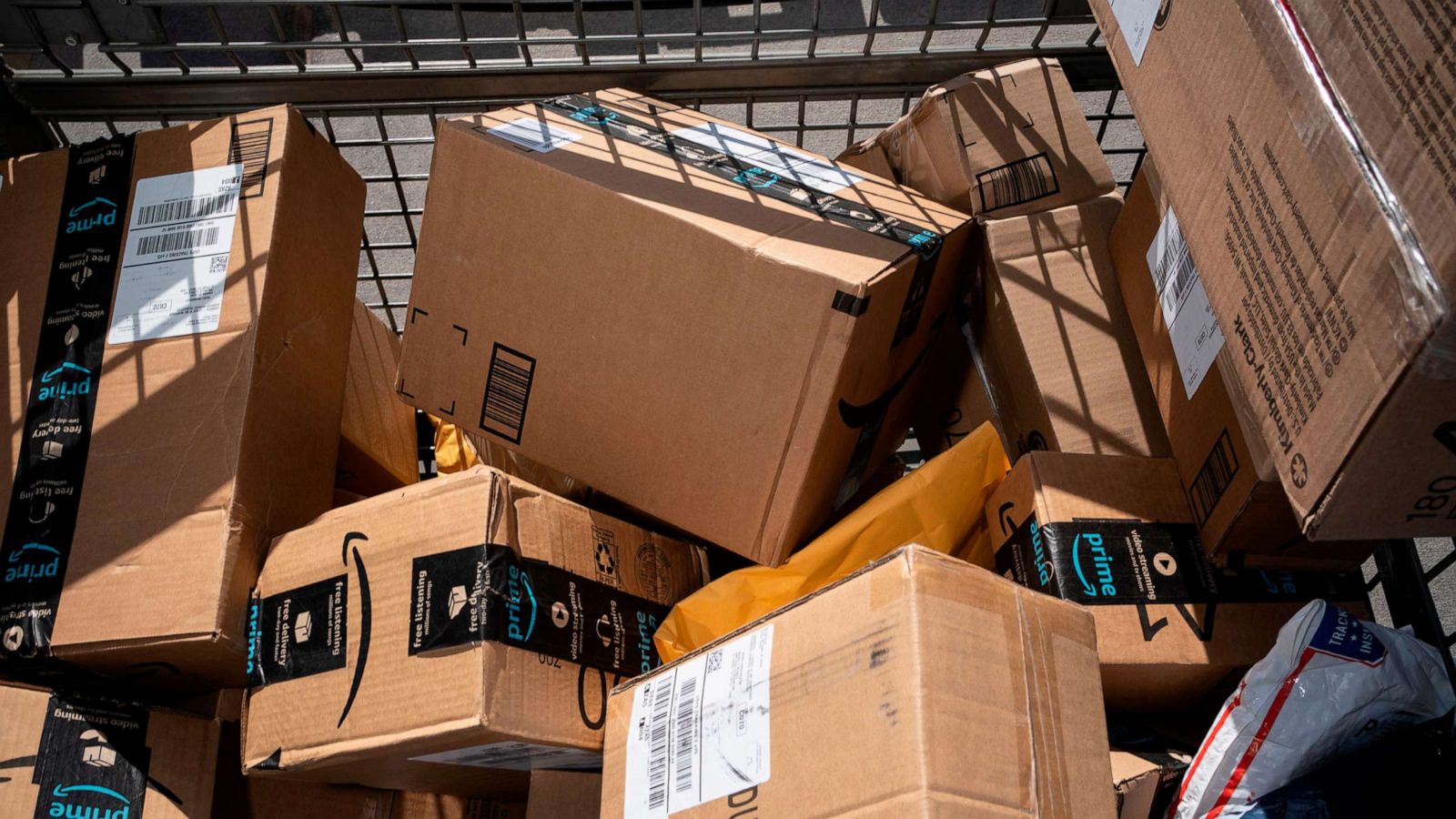 PHOTO: In this April 30, 2020 packages fill a basket to the brim before being loaded into trucks to depart on delivery routes at the Remcon Circle United States Postal Service Post Office in El Paso, Texas.