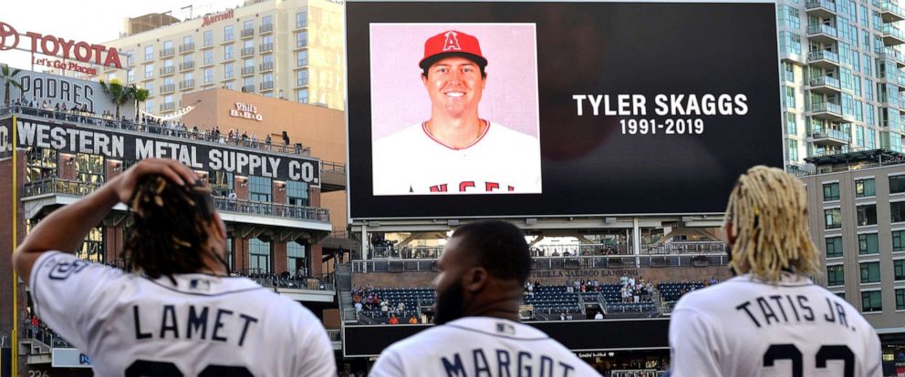 PHOTO: The San Diego Padres pay tribute to Los Angeles Angels pitcher Tyler Skaggs before a game against the San Francisco Giants at Petco Park.