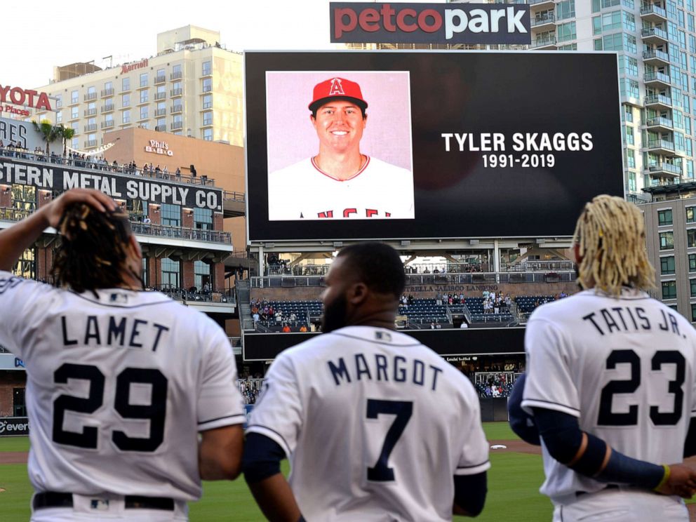 PHOTO: The San Diego Padres pay tribute to Los Angeles Angels pitcher Tyler Skaggs before a game against the San Francisco Giants at Petco Park.
