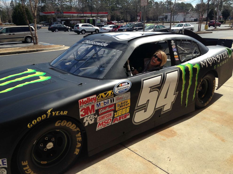 PHOTO: Page Zeringue is photographed in a race car sponsored by Monster Energy.