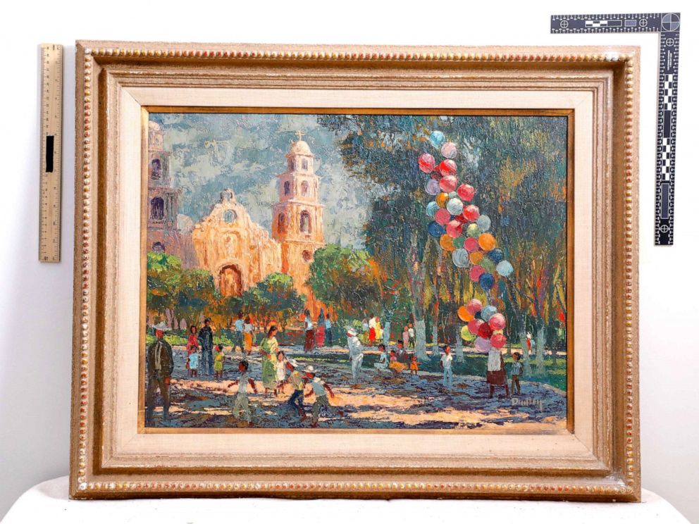 PHOTO: Framed painting of a day in the park.