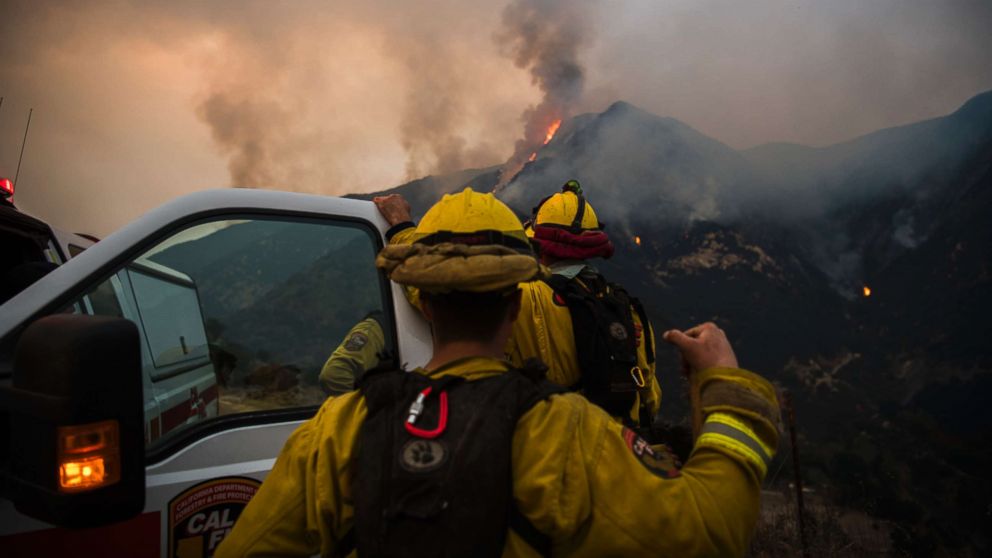 Cal Fire firefighters from the Lake Napa Unit observe fire behavior at the Thomas Fire above Toro Canyon in Carpinteria Monday. 

The Thomas Fire burns in Toro Canyon in the hills above Montecito, Calif., Dec. 11, 2017. By nightfall the fire had burned 230,000 acres and was 15% contained, destroying nearly 800 homes. 