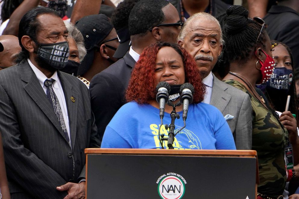 PHOTO: Tamika Palmer, mother of Breonna Taylor, speaks at the March on Washington, Aug. 28, 2020, at the Lincoln Memorial in Washington, D.C. At left is Rep. Al Green, D-Texas, and at right is Rev. Al Sharpton. 