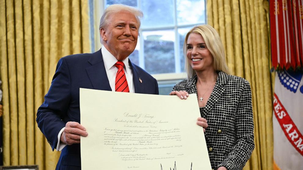 PHOTO: President Donaldf Trump and Pam Bondi pose with a certificate after she was sworn in as US Attorney General in the Oval Office of the White House in Washington, Feb. 5, 2025.