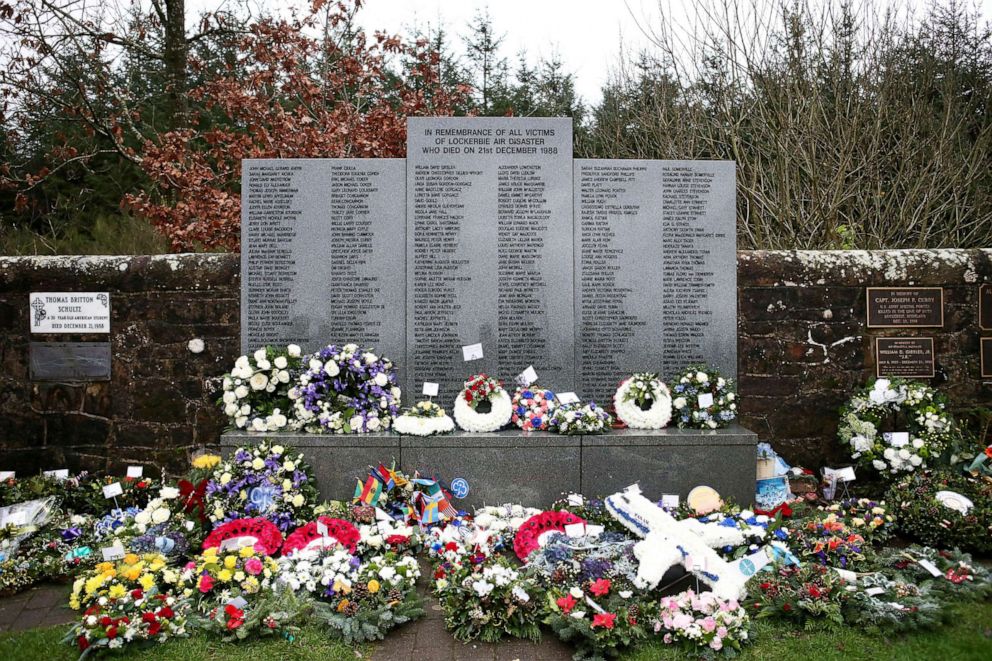 PHOTO: FILE PHOTO: Floral tributes left at the Memorial Garden in Dryfesdale Cemetery, are seen on the morning of the 30th anniversary of the bombing of Pan Am flight 103 which exploded over the Scottish town on December 21, 1988.