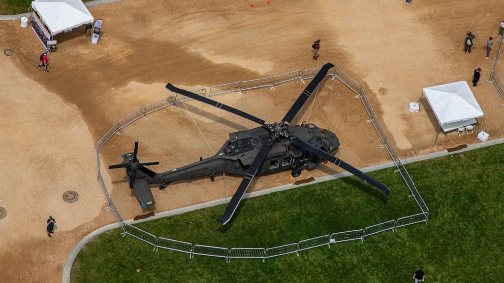 PHOTO: A U.S. Army helicopter is displayed at the National Mall, June 13, 2025, for the Army birthday festival in Washington.