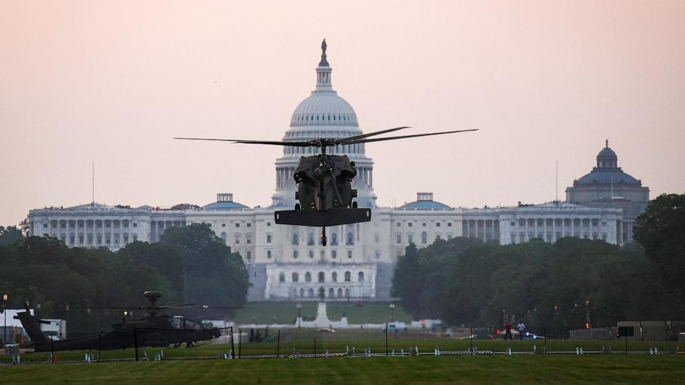 PHOTO: A Sikorsky UH-60 Black Hawk helicopter to be used in the U.S. Army's 250th Birthday Celebration and Parade, prepares to land on the National Mall near the U.S. Capitol in Washington, June 11, 2025. 