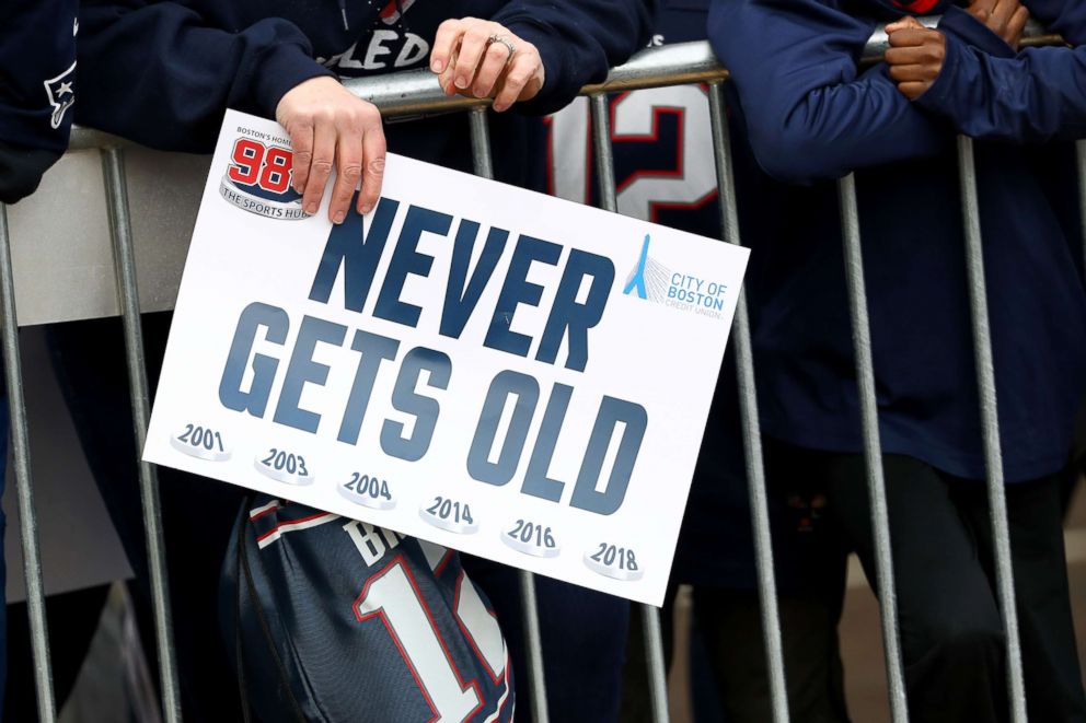 PHOTO: A fan holds a sign to celebrate during the New England Patriots Victory Parade, Feb. 5, 2019, Boston.