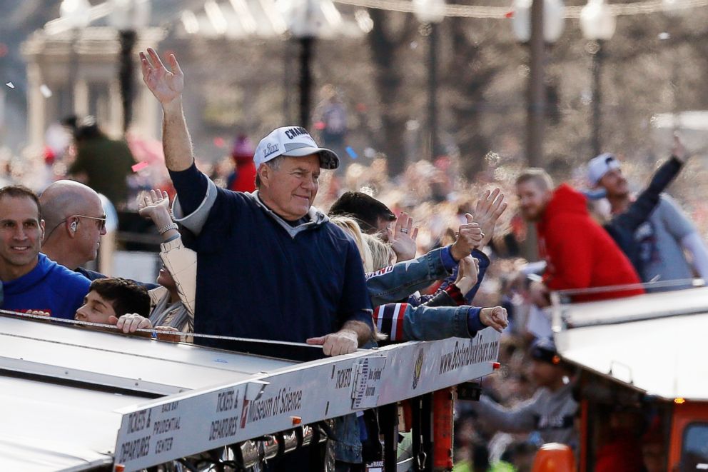 PHOTO: New England Patriots head coach Bill Belichick waves to the crowd during the New England Patriots parade through downtown Boston, Feb. 5, 2019, to celebrate their win over the Los Angeles Rams in Sunday's NFL Super Bowl 53 football game.