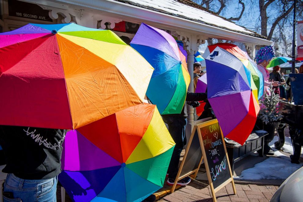 PHOTO: The Parasol Patrol uses rainbow umbrellas to protect children and families from facing hate groups protesting their events.