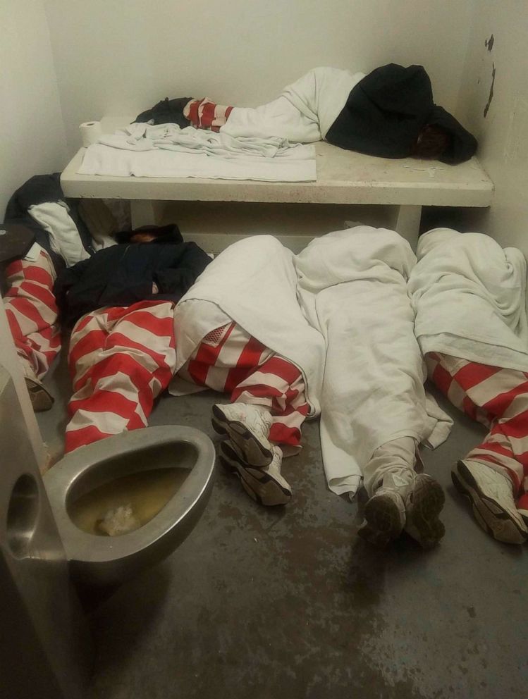 PHOTO: This undated photo taken by an inmate at Mississippi State Penitentiary at Parchman and provided to AP shows inmates seen lying on the floor next to a full toilet.