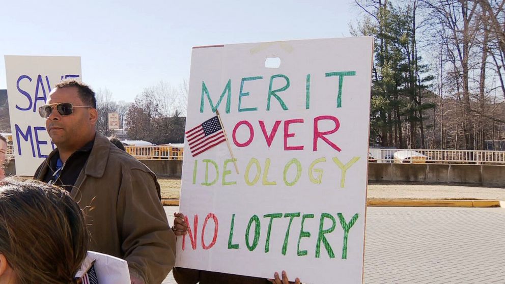 PHOTO: Parents picket about the merit controversy in Fairfax County, Virginia, on Jan. 14, 2023.