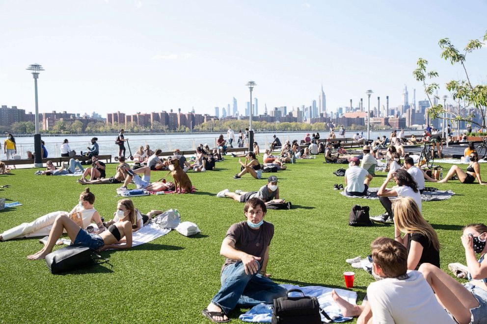 PHOTO: People are shown enjoying the warm weather at Domino Park in Williamsburg neighborhood in the Brooklyn, New York on May 3, 2020, during the COVID-19 outbreak.