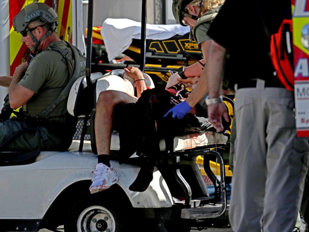 PHOTO: Medical personnel tend to a victim following a shooting at Marjory Stoneman Douglas High School in Parkland, Fla., on Feb. 14, 2018.