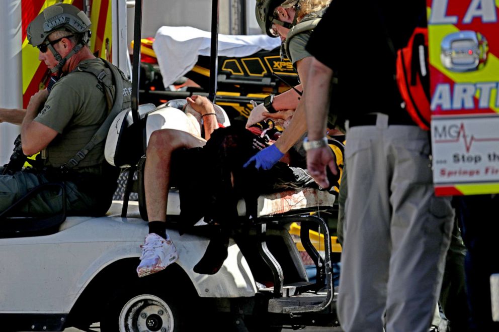 PHOTO: Medical personnel tend to a victim following a shooting at Marjory Stoneman Douglas High School in Parkland, Fla., on Feb. 14, 2018.