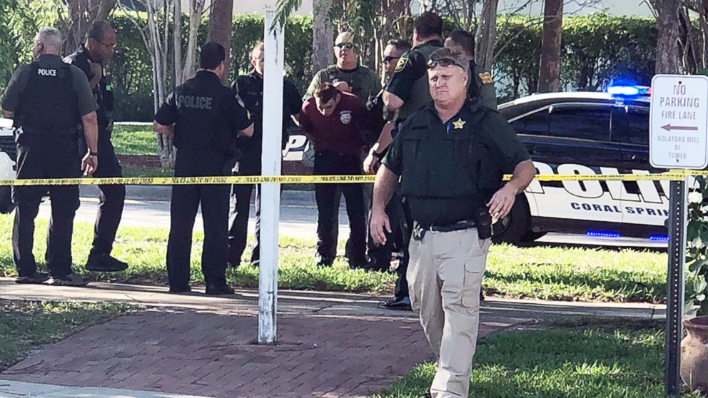 Nikolas Cruz is arrested by authorities after a shooting at Marjory Stoneman Douglas High School in Parkland, Fla., Feb. 14, 2018.