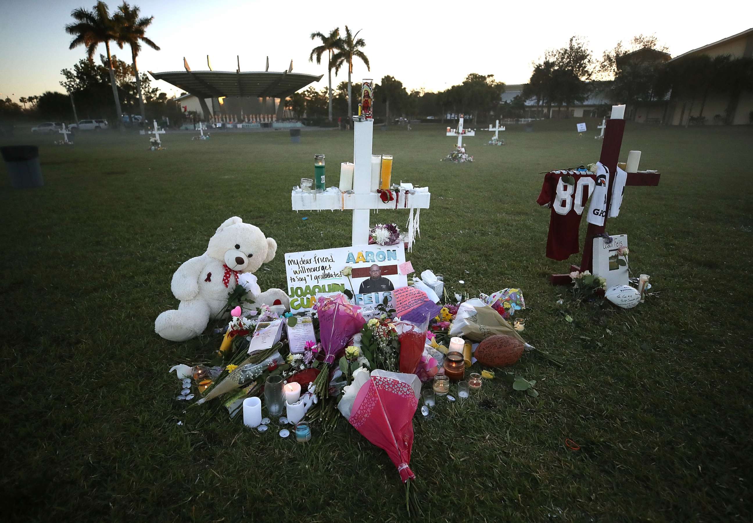 PHOTO: Flowers and mementos are placed on a memorial site, Feb. 17, 2018, for those killed mass shooting at Marjory Stoneman Douglas High School, in Parkland, Fla.