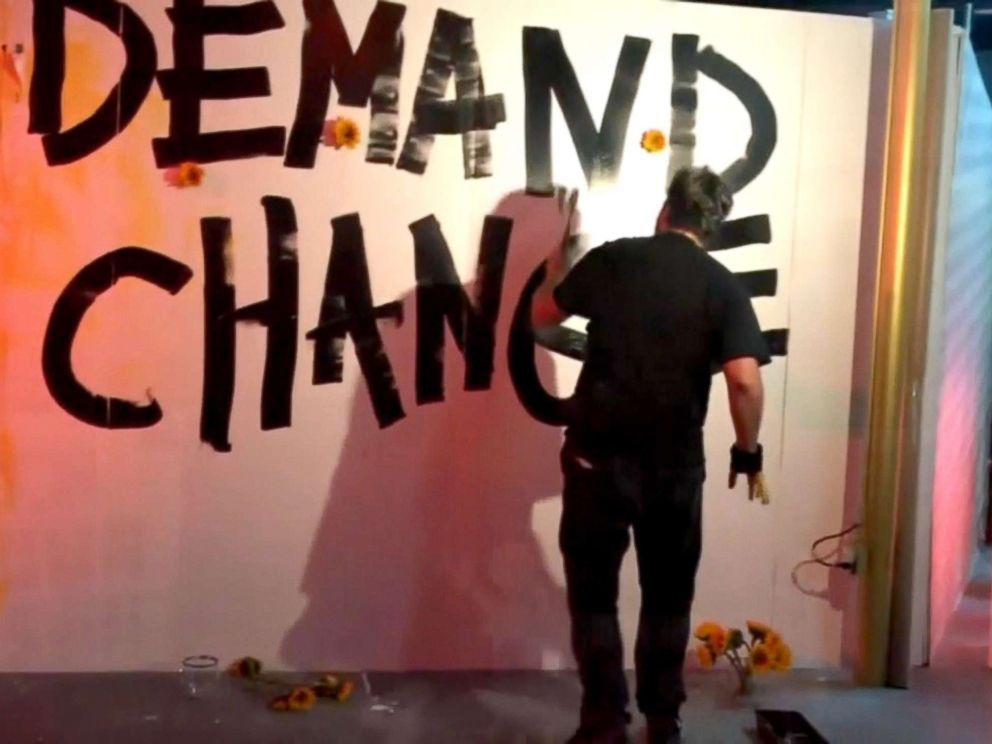 PHOTO: Manuel Oliver paints a mural for his son Joaquin, who was killed in the Stoneman Douglas mass shooting.