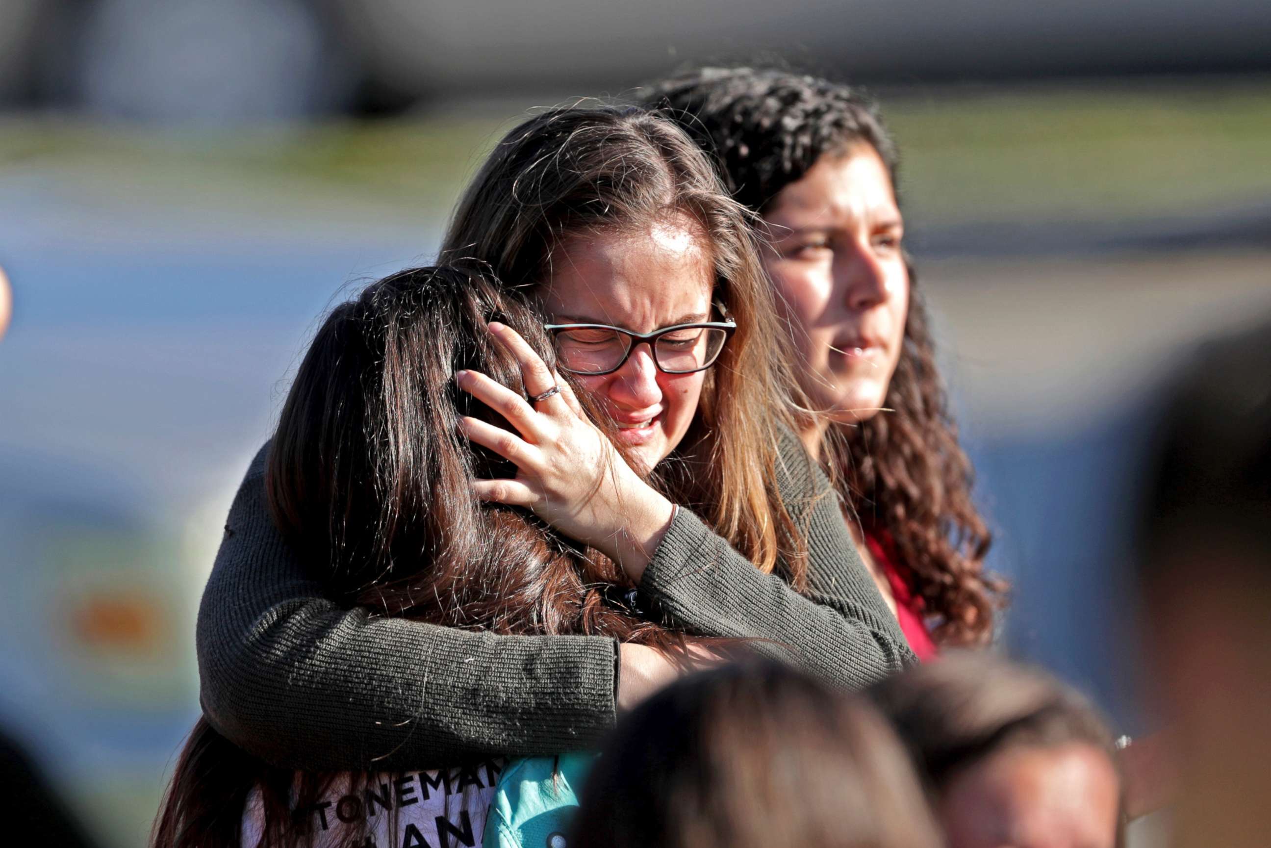 PHOTO: Students released from a lockdown embrace following a shooting at Marjory Stoneman Douglas High School in Parkland, Fla., Feb. 14, 2018.