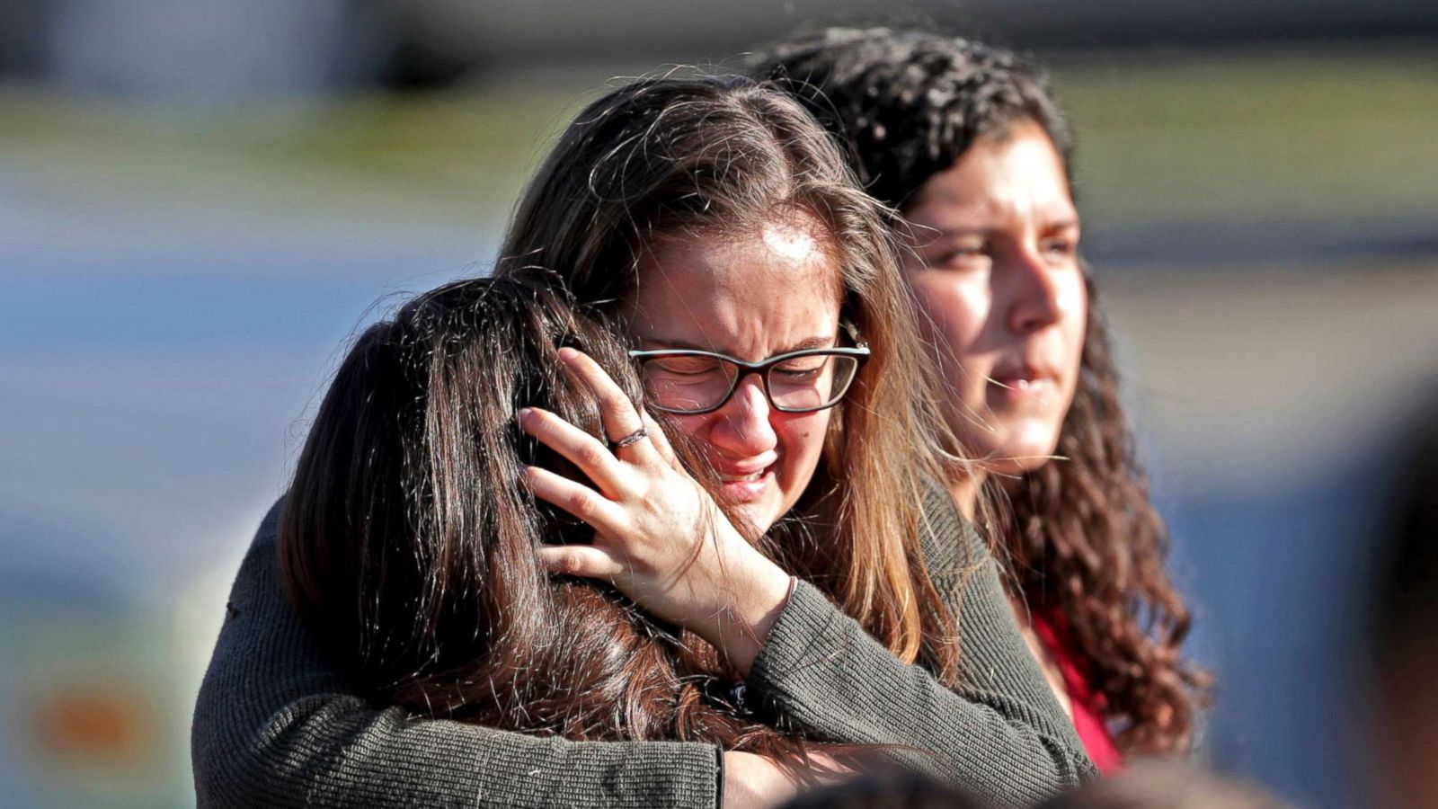 PHOTO: Students released from a lockdown embrace following a shooting at Marjory Stoneman Douglas High School in Parkland, Fla., Feb. 14, 2018.