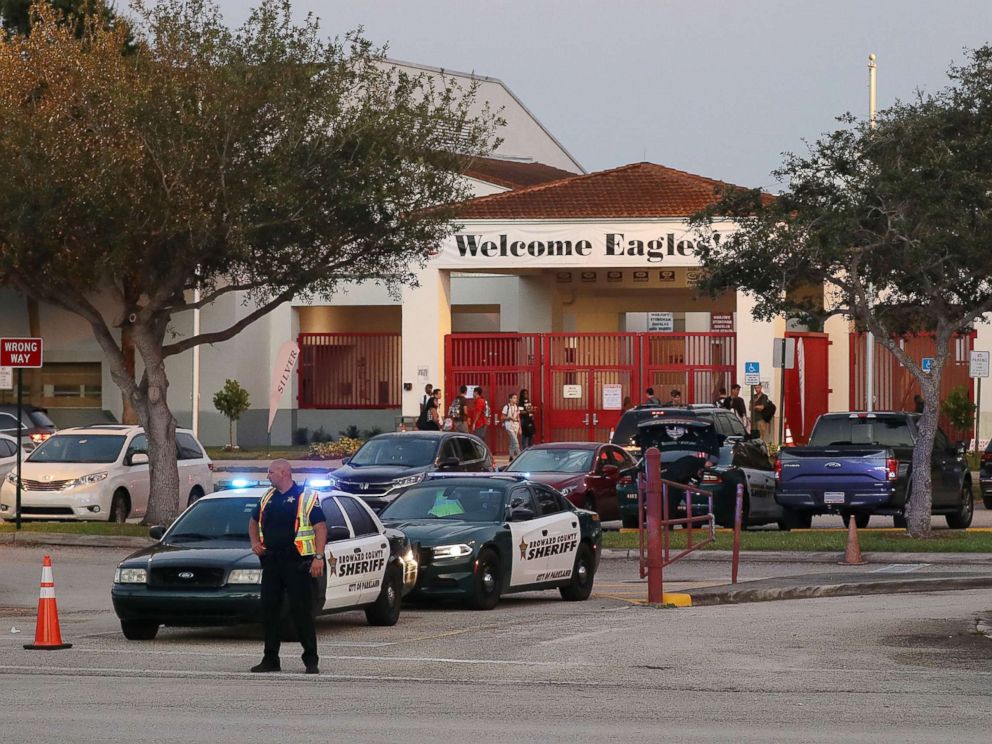 PHOTO: Police keep the campus secure as students arrive at Marjory Stoneman Douglas High School on the first day of school on Aug. 15, 2018, in Parkland, Fla.