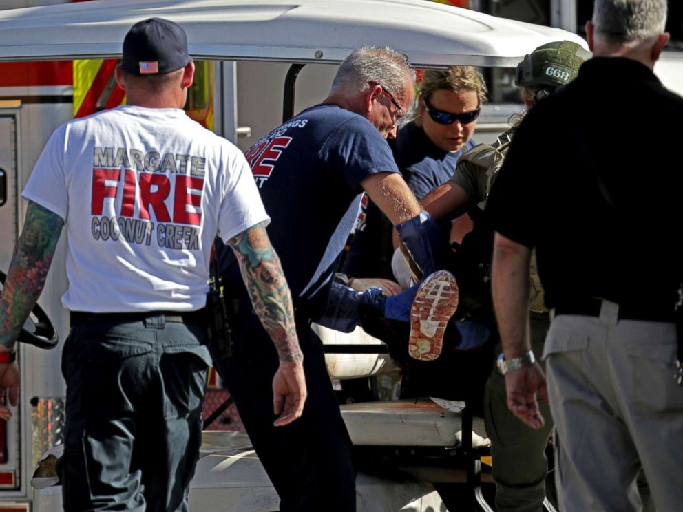 PHOTO: Medical personnel tend to a victim following a shooting at Marjory Stoneman Douglas High School in Parkland, Fla., Feb. 14, 2018.
