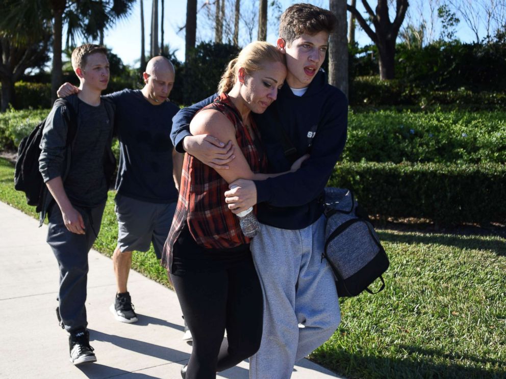 PHOTO: Students react following a shooting at Marjory Stoneman Douglas High School in Parkland, Fla., Feb. 14, 2018.