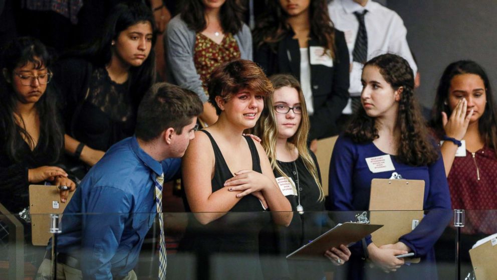 Students from Marjory Stoneman Douglas High School and those supporting them react as they watch the Florida House of Representatives vote down a procedural move to take a bill banning assault weapons out of committee and bring it to the floor for a vote, Feb. 20, 2018, in Tallahassee, Fla.