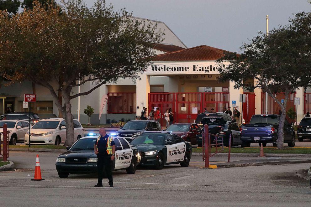 PHOTO: Police keep the campus secure as students arrive at Marjory Stoneman Douglas High School on the first day of school on Aug. 15, 2018, in Parkland, Fla.