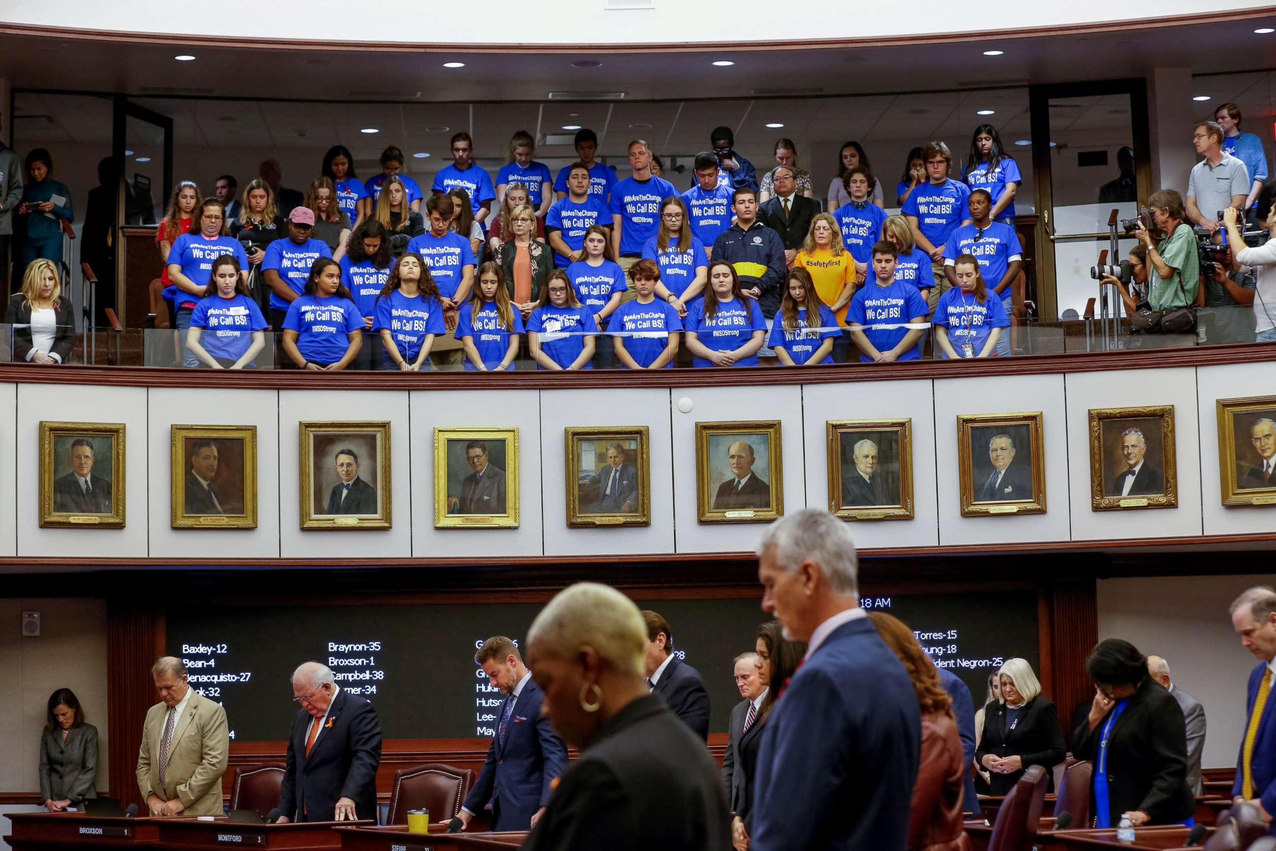 PHOTO: Students and their chaperones from Marjory Stoneman Douglas High School, wearing blue t-shirts, stand in the gallery above the Florida Senate as it held a moment of silence in honor of the victims of the mass shooting, February 21, 2018.