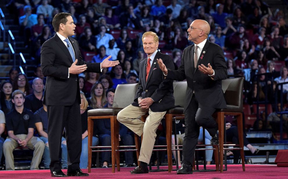 PHOTO: Senator Marco Rubio, left, and Congressman Ted Deutch disagree during a CNN town hall meeting at the BB&T Center, in Sunrise, Florida, Feb. 21, 2018. 