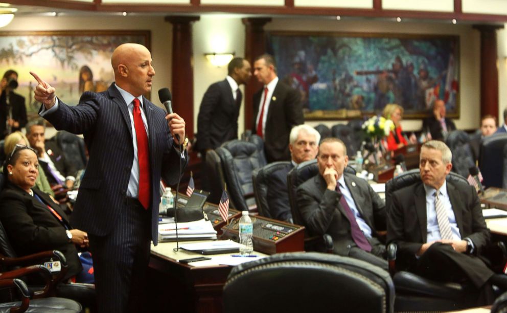 PHOTO: Florida State Rep. Joseph Abruzzo, left, debates the gun/school safety bill on the floor of the House, March 7, 2018 in Tallahassee. 