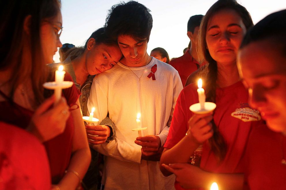 PHOTO: Students gather during a vigil at Pine Trails Park for the victims of the shooting at Marjory Stoneman Douglas High School in Parkland, Fla., Feb. 15, 2018.