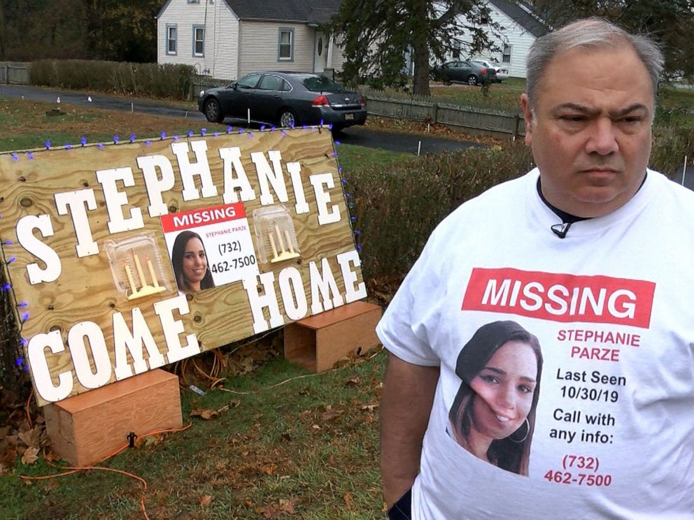 PHOTO: Edward Parze stands next to a large sign Monday, November 18, 2019, outside his Freehold home that asks his missing daughter Stephanie to come home. The woman has been missing since the night before Halloween.