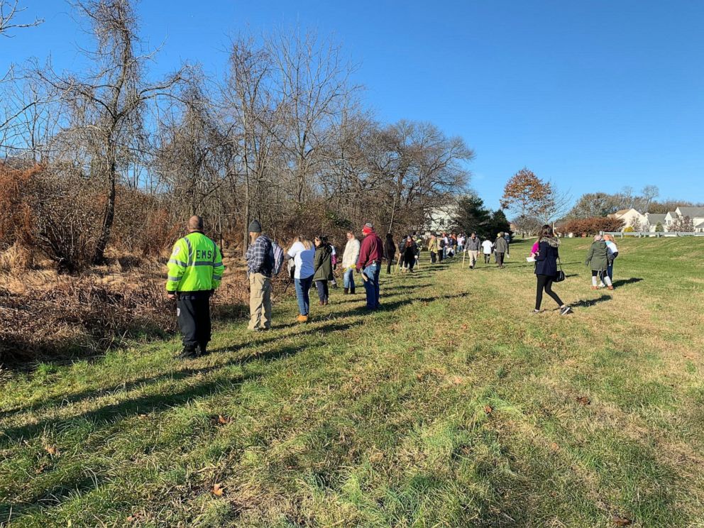 PHOTO: Volunteers gather Thursday, Nov. 21, 2019, to search for Stephanie Parze in a wooded area near her Freehold Township house.