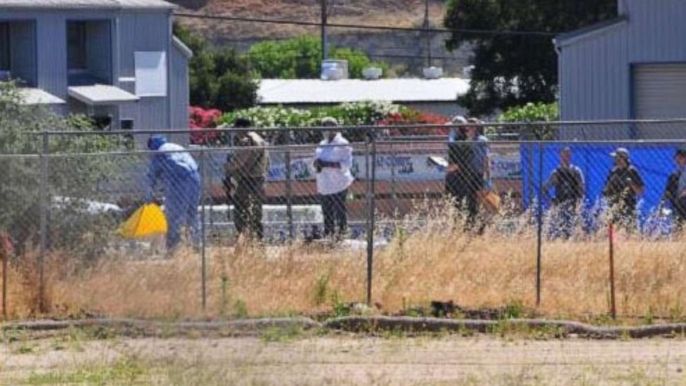 PHOTO: Sheriff personnel searching area for evidence regarding fatally wounded gunshot victim found near railroad tracks in Paso Robles, Calif., June 10, 2020.