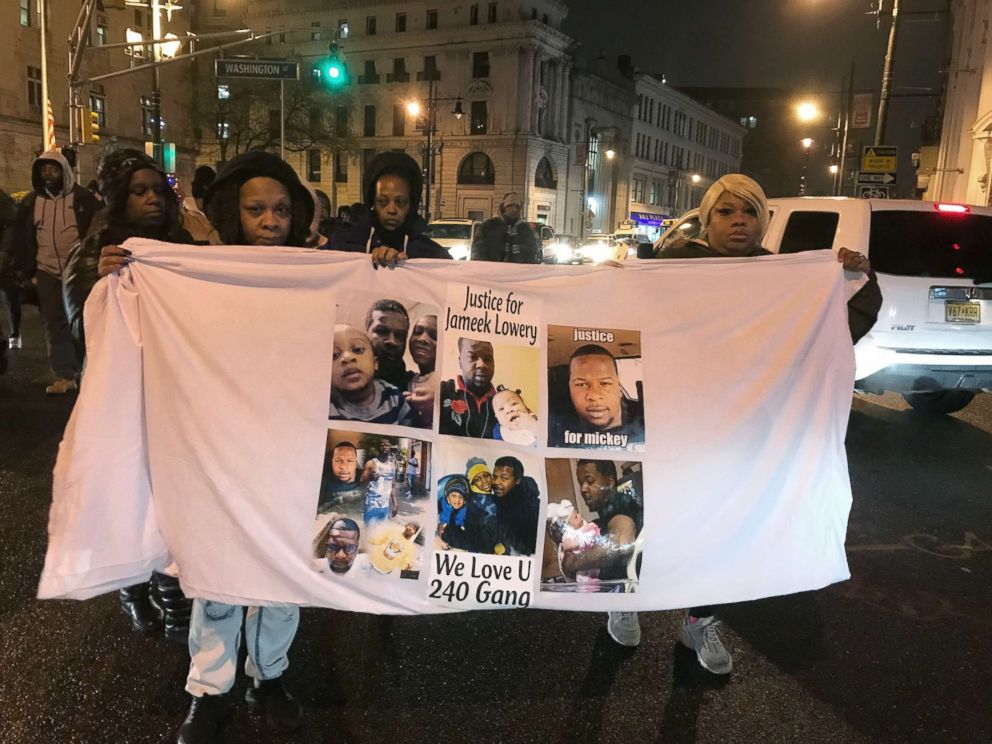 PHOTO: Two women hold a banner for Jameek Lowery at a rally in Paterson, N.J., Jan. 8, 2019 after Lowery's death.
