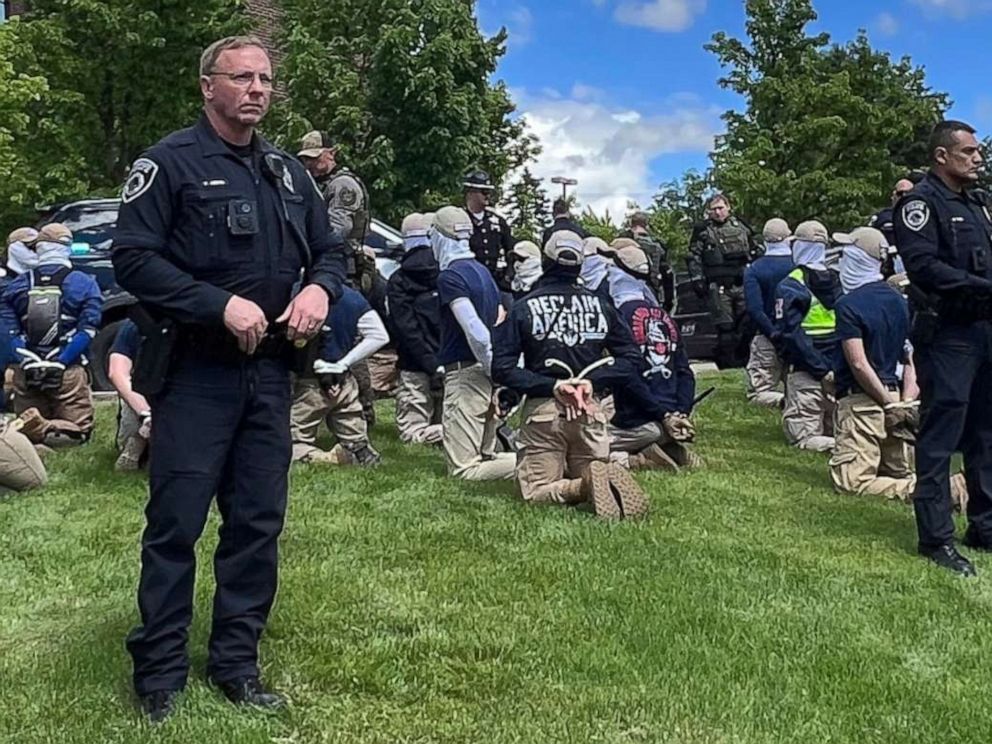 PHOTO: Authorities arrest members of the white supremacist group Patriot Front near an Idaho pride event after they were found packed into the back of a U-Haul truck with riot gear in Coeur d'Alene, Idaho, June 11, 2022.