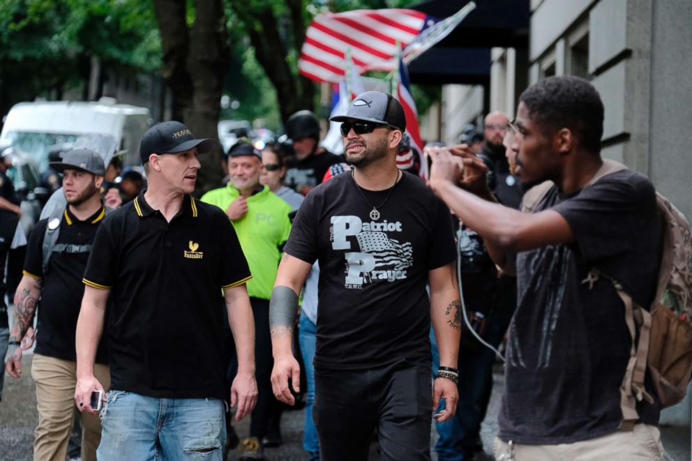 PHOTO: Joey Gibson leads Patriot prayer members through the streets of Portland, Ore., during a freedom march, June 3, 2018.